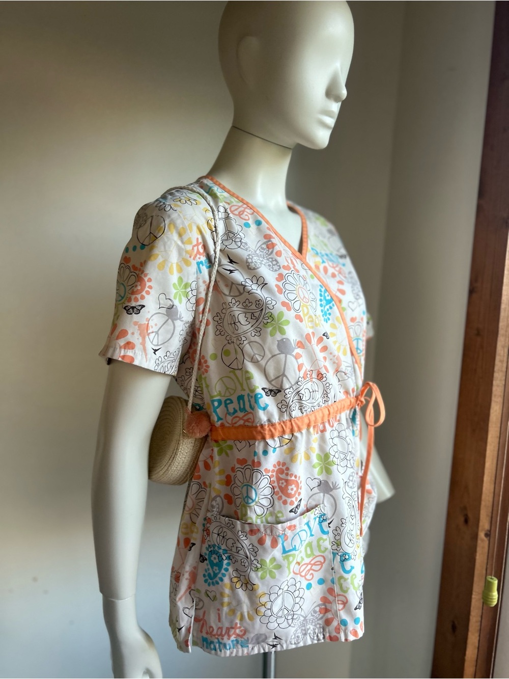 Smart Scrubs H.Q Multicolor Floral Peace Sign Scrub Top with Peach Trim M